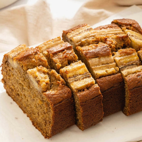 Sliced Protein Banana Bread on a white plate from Fierce Fuel.