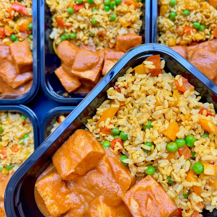 Ready-made Fierce Fuel plastic containers filled with Peri Peri Tofu and Mediterranean Rice available for delivery.