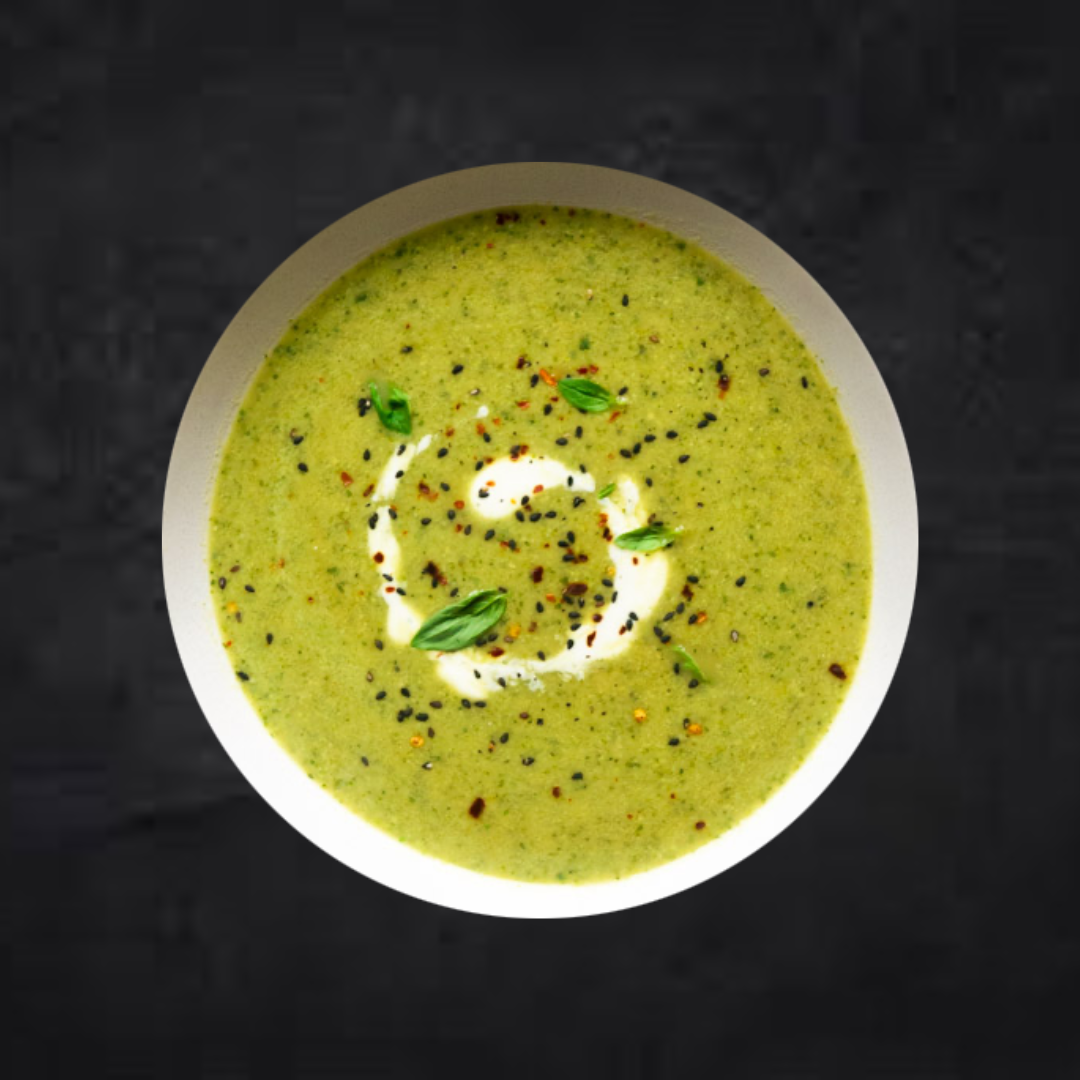 A bowl of Fierce Fuel Cream of Broccoli Soup, a ready-made and healthy meal.