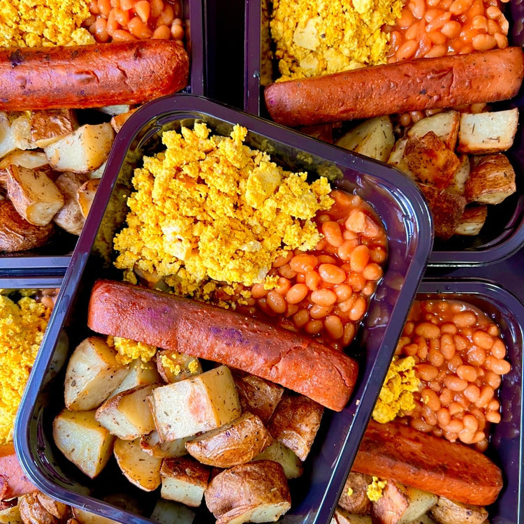 A ready-made English Brekkie tray delivered by Fierce Fuel, including potatoes, sausage, beans, and eggs.