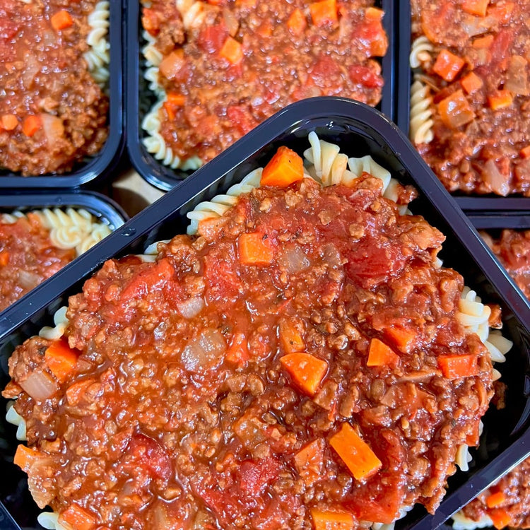 A Fierce Fuel Classic Pasta Bolognese tray with protein-rich mince and vegetables.